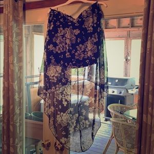Black high low skirt with floral pattern